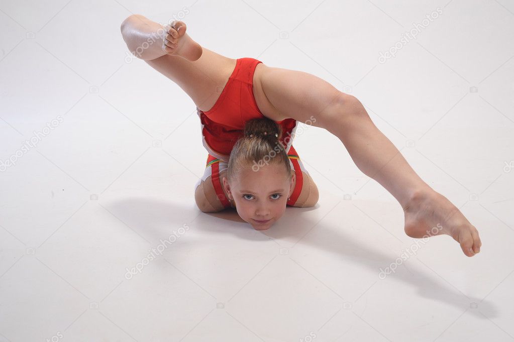 Young girl doing gymnastics 
