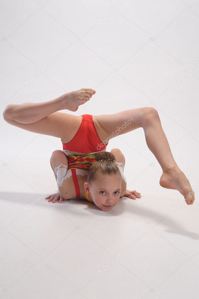 Young girl doing gymnastics Stock Photo by ©evdoha 5476262