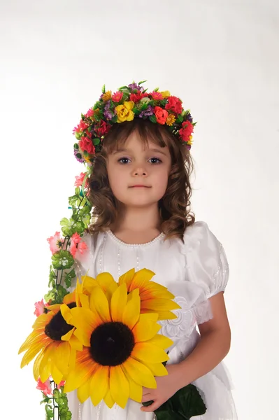 Girl and sunflower — Stock Photo, Image