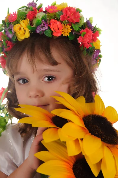 Mädchen und Sonnenblume — Stockfoto