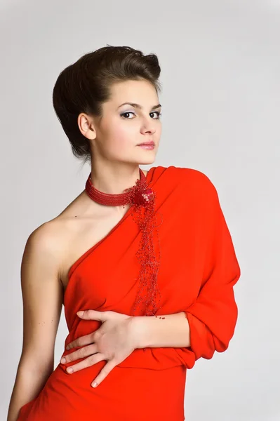 Mulher elegante no vermelho — Fotografia de Stock