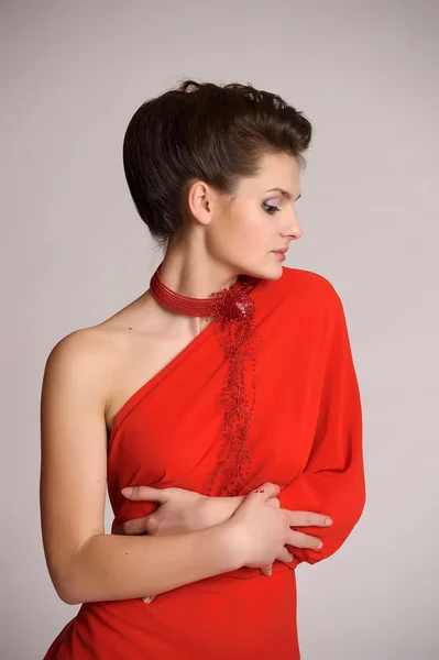 Elegantní žena v červené barvě — Stock fotografie