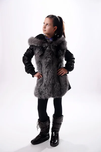 Menina em um casaco de pele — Fotografia de Stock