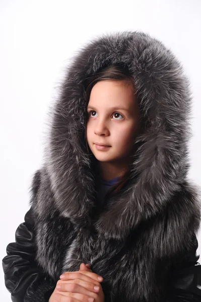 stock image Girl in a fur coat