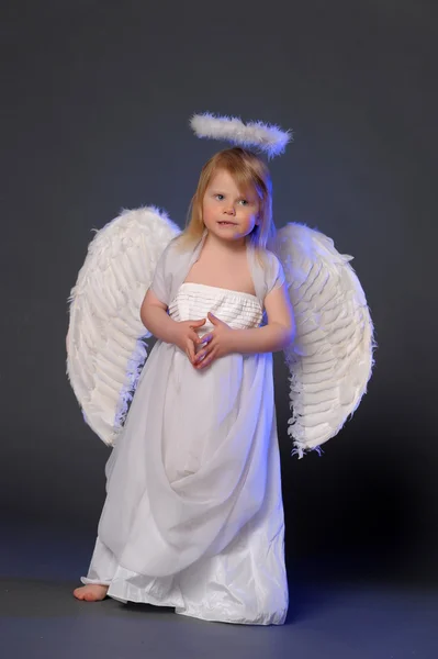 Girl in angel costume Royalty Free Stock Images