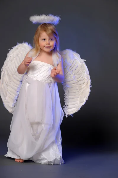 Girl in angel costume Stock Image