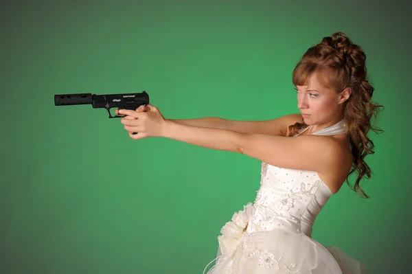 Bride with gun Stock Image