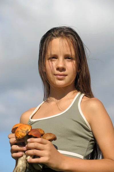 The girl with ceps — Stock Photo, Image