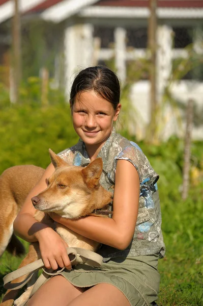 Girl and puppy — Stock Photo, Image