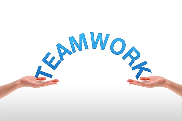 Handen met het woord teamwork — Stockfoto