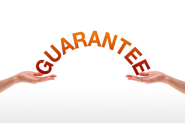 Hands holding the word guarantee. — Stock Photo, Image