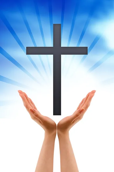 Hand hält ein Kreuz — Stockfoto