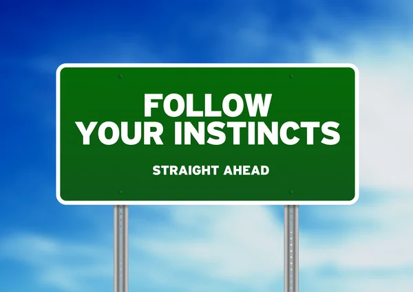 Green Road Sign - Follow Your Instincts — Stock Photo, Image