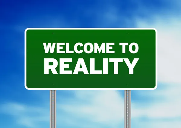 Green Road Sign - Welcome to Reality — Stock Photo, Image