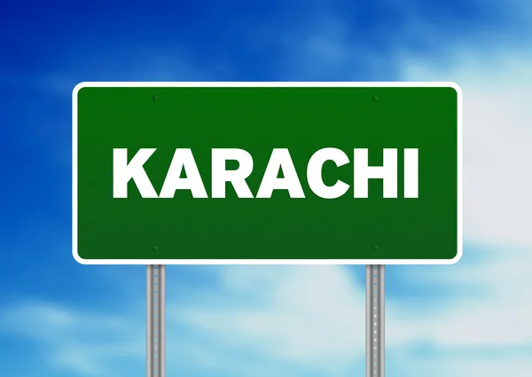 Зелений дорожній знак - Карачі, Об'єднані Арабські Емірати — стокове фото