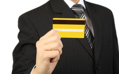 Erkek el beyaz zemin üzerinde bir kredi kartı ile