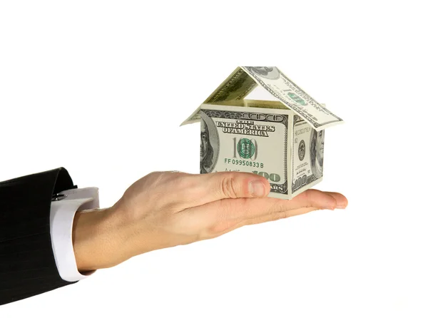 stock image House of money in human hands