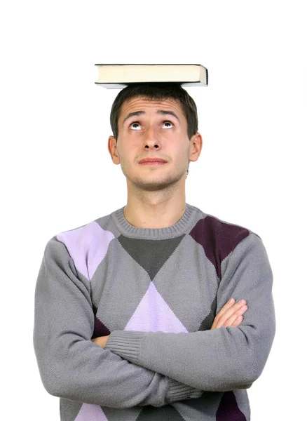 在白色背景上孤立他头上的一本书的家伙 — 图库照片