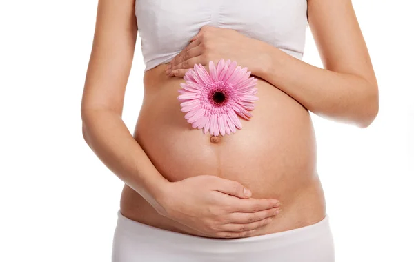 stock image Pregnant woman with flower