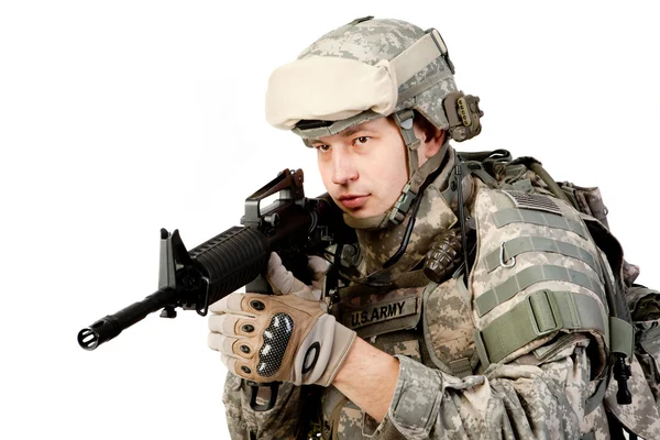 Soldato con fucile su sfondo bianco — Foto Stock