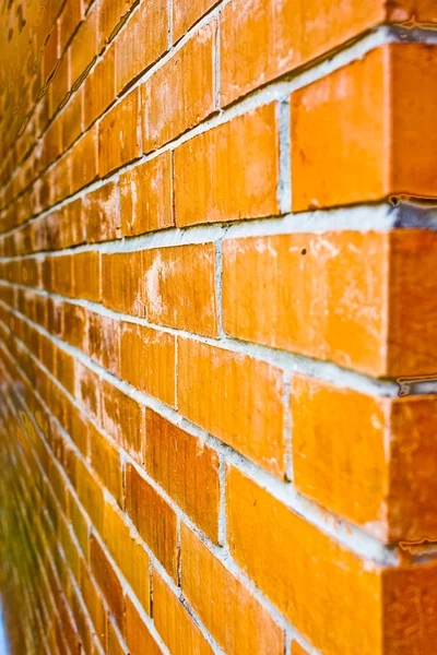 Close-up details voor een oranjebruine bakstenen muurTuruncu-kahverengi tuğla bir duvara yakın çekim detayları. — Stockfoto