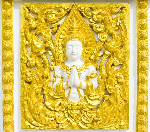 Estátua sobre religião na parede, templo tailandês — Fotografia de Stock