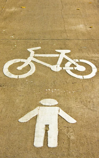 Símbolo de bicicleta e pista de caminhada — Fotografia de Stock