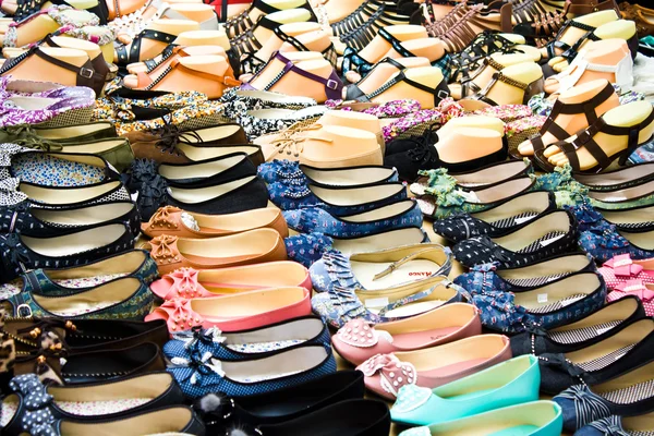 stock image Rows of fashion shoes in the shop