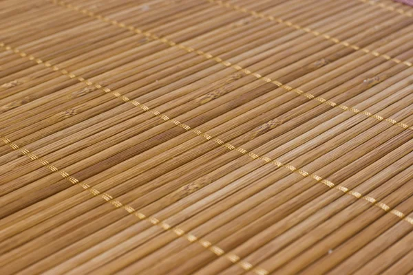 Фон бамбукові палички з об'єднанням ниток — стокове фото
