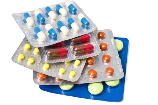 Çeşitli ilaç paketleri yığın — Stok fotoğraf