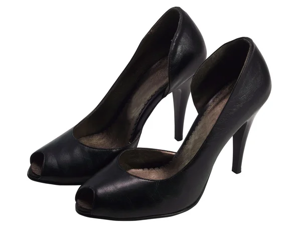 Svarta kvinnliga skor på en hög klack — Stockfoto