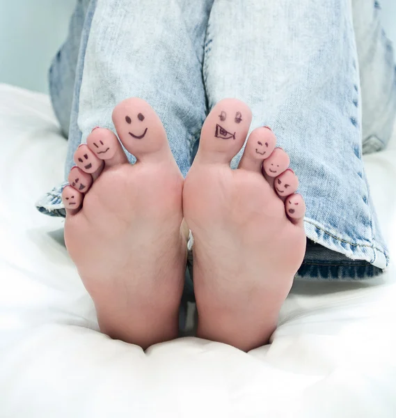 Happy Smiley Faced Feet Royalty Free Stock Photos
