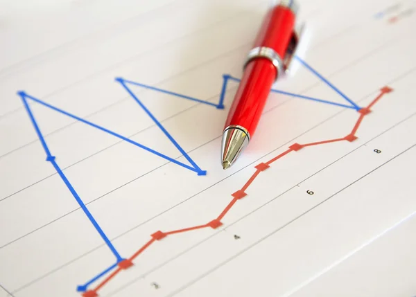 Red pen on the diagram background — Stock Photo, Image