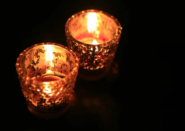 stock image Candle in dark room
