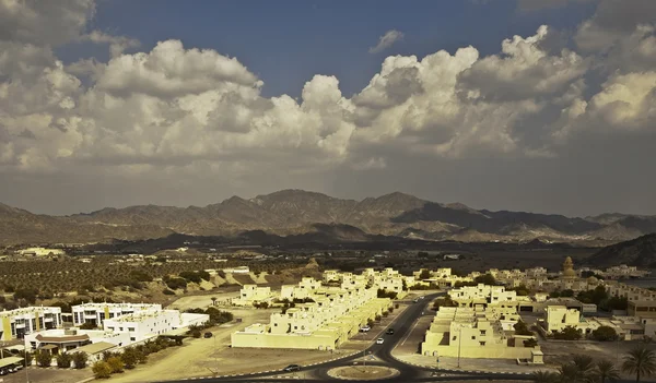Village on the middle east near mountains on cloudy day — Stock Photo, Image
