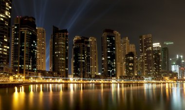 Town scape at night time. Panoramic scene, Dubai. clipart