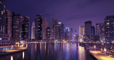 Town scape at night time. Panoramic scene, Dubai. clipart