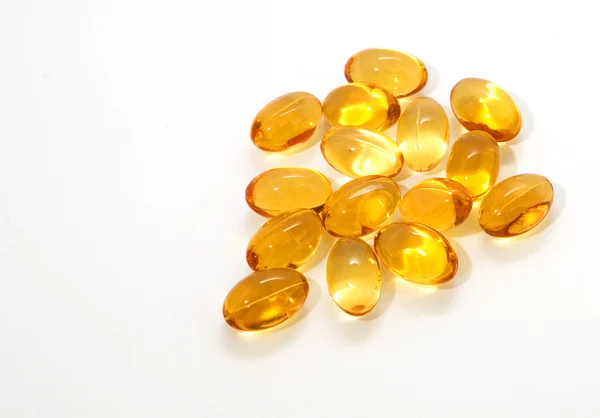 ビタミンは黄色の油のカプセル — ストック写真