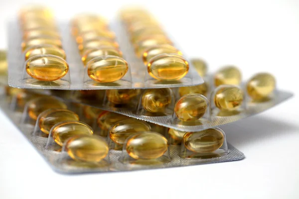 Oil vitamins yellow capsule — Stock Photo, Image