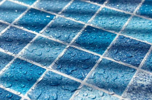 Azulejos azuis na piscina — Fotografia de Stock