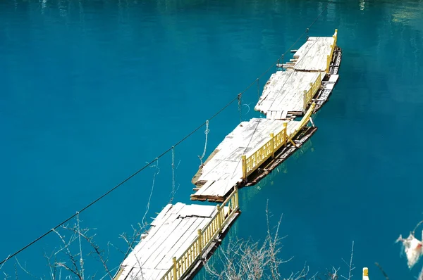 Floating boats in lake — Stock Photo, Image
