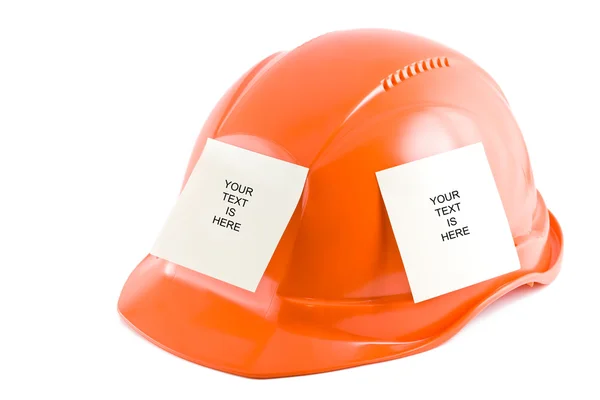 Protective helmet and note stickers on the white background. — Stock Photo, Image