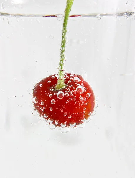 Cherry in the water. — Stock Photo, Image