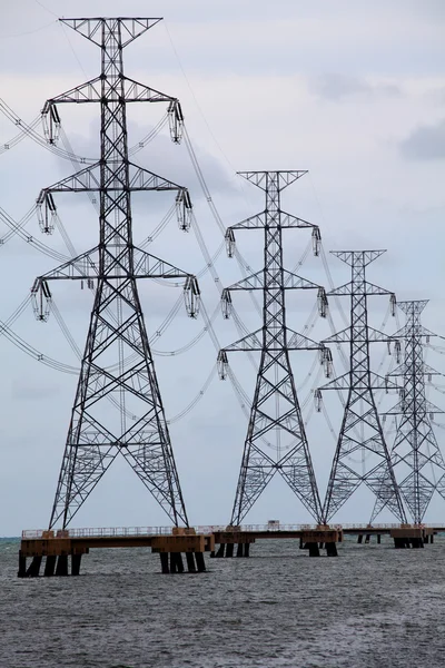 Electrical towes acoss sea — Stock Photo, Image