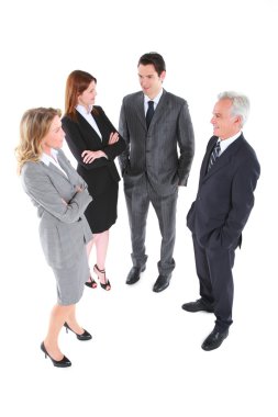 Businessman and businesswoman standing chatting clipart