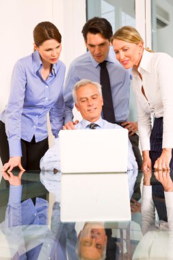 Businessman and businesswoman during a working meeting clipart