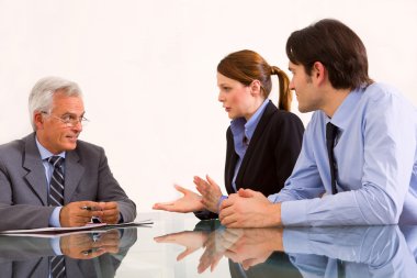 Two men and one woman during a job interview clipart