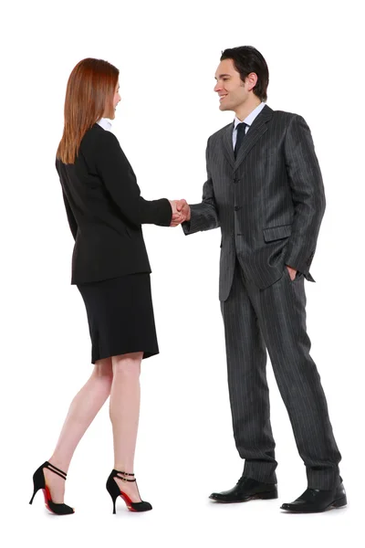 Businessman and businesswoman shaking hands — Stock Photo, Image
