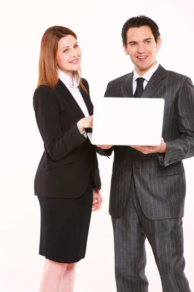 Uomo d'affari e donna d'affari con laptop — Foto Stock