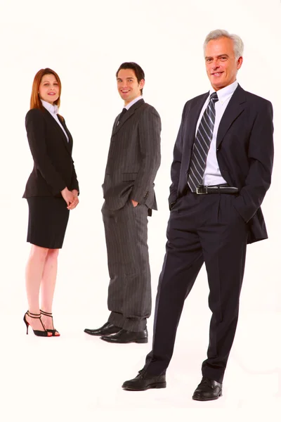 Dois homens de negócios e uma mulher de negócios — Fotografia de Stock